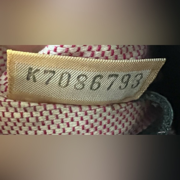 Dooney & Burke black logo printed fabric with black pebbled leather accents. - Picture 7 of 9